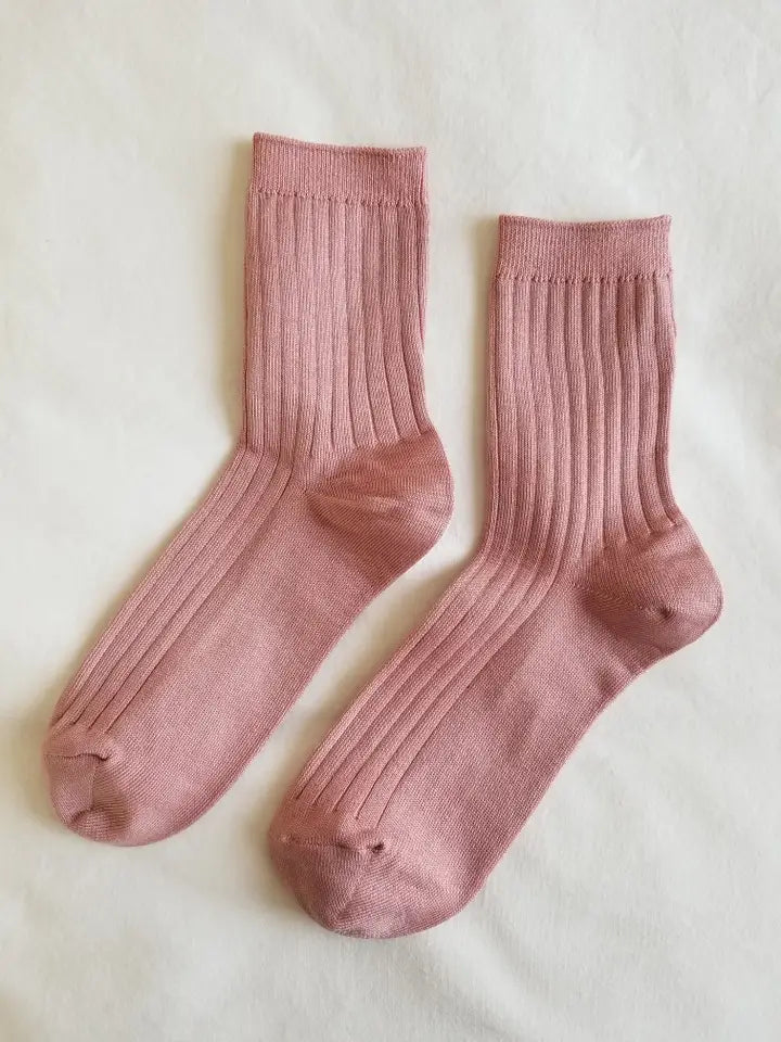 Her Socks in Desert Rose